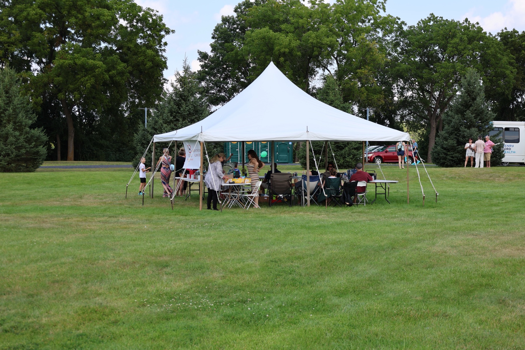 A welcoming outdoor fellowship tent on the Brighton grounds